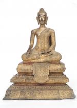 Bouddha assis dans le geste de la prise de la...