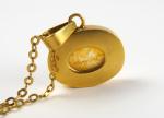 Collier en or composée d'une chaine retenant un pendentif avec...