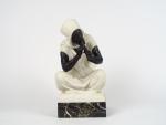 PUGI. "Le charmeur de serpent"
Sculpture en marbre et bronze. 
Socle...
