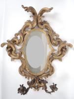 Miroir italien XIXème en bois sculpté, doré et ajouré, à...