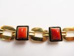 BOUCHERON. Bracelet Art Déco en or, orné de 6 cabochons...