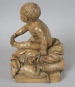 "Jeune enfant à la fleur"
Sujet 1900 en terre cuite patinée.
H....