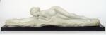 A. GENARELLI. "Femme nue allongée". Sculpture en marbre blanc, sur...