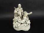 Groupe en porcelaine blanc-de-Chine représentant un sage apprivoisant un dragon...
