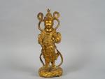 Statuette en bronze laqué et doré, représentant un Lokapala en...