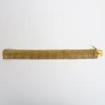 Bracelet souple en or jaune maille tressée.
Poids. 48 g