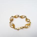 Bracelet de style Art Nouveau en or jaune et perles
Poids...
