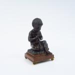 CANTRELLE
"Bacchus enfant"
Sculpture XIXème en bronze à patine brune.
Socle en marbre...