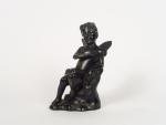Sculpture en bronze à patine brune "Fillette ailée". 
H. 24...