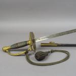 Epée d'officier modèle 1812, monture en bronze doré, plateau en...