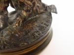 P.J. MENE. "Griffon assis".
Sculpture en bronze à patine médaille. 
Signée.
H....