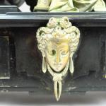 Pendule XIXème en marbre noir et bronze, à décor d'un...