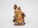 Statuette en stéatite représentant Laotse accompagné d'une grue et tenant...