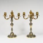 Paire de candélabres XIXème de style Louis XVI en bronze...