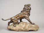 ANDREY. "Lion rugissant sur un rocher"
Sculpture en bronze à patine...