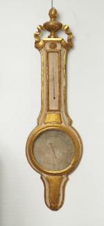 Baromètre Louis XVI en bois laqué doré, à décor de...