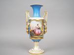Vase à anses XIXème de style Louis XVI en porcelaine...