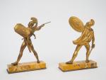 Paire de statuettes XIXème en bronze figurant des guerriers antiques.
Socle...