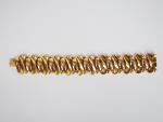 Bracelet articulé en or jaune. 
Long. 18 cm 
Poids. 55.44...