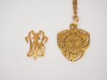 Médaille de baptême en or jaune, à décor ajouré de...