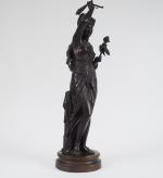 Jean BULIO. 'Jeune femme à la marionette'.
Sculpture en bronze à...