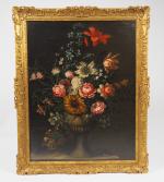 Ecole XVIIème. "Bouquet de fleurs dans un vase".
Huile sur toile....