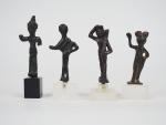 Quatre statuettes antiques en bronze. Différentes origines et périodes. H....