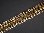Bracelet articulé en or jaune. 
Long. 20 cm
Poids. 42,14 g