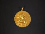 Médaille de baptême en or jaune, à décor d'un angelot....