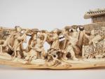 Sculpture sur ivoire représentant une scène de théatre se déroulant...