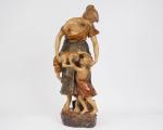 Luca MADRASSI.
'Mère et ses enfants'.
Sculpture en stuc polychrome.
Signée.
H. : 77...