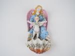Bénitier 1900 en biscuit polychrome à décor d'archange et d'enfant...