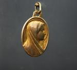 Médaille de baptême en or, à décor de profil de...