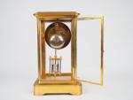 Pendule cage fin XIXème en bronze et cristal, cadran émaillé.
Avec...