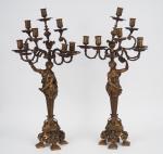 Paire de chandeliers de style Louis XIV en bronze patiné...